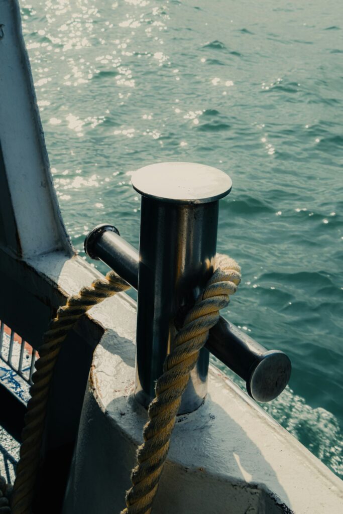 Mooring bollard and rope on a ship’s deck at sea